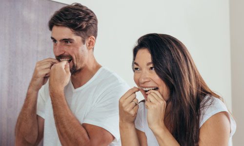 how to floss your teeth